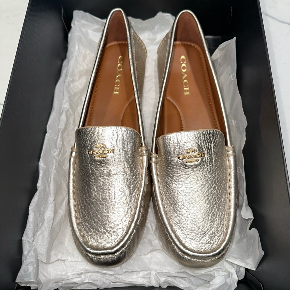 Coach MARLEY DRIVER Flat CHAMPAGNE
Size: 9.5 B New